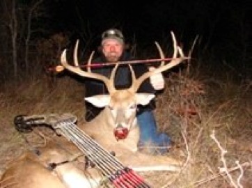 Whitetail deer hunter and 4n2 rattler Rick Philippi with his record buck